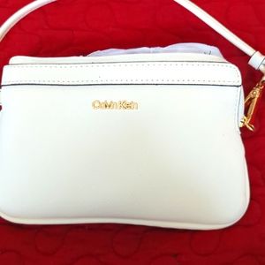 Calvin Klein cream wristlet